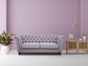 Sofa in purple living room with copy space for mock up, 3D rende